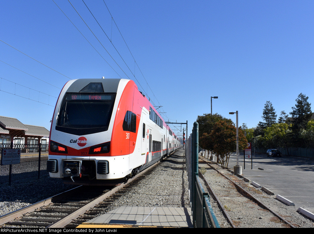 Caltrain # 132 heads away from Santa Clara platform toward San Jose Diridon Depot